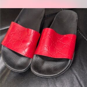 Gucci Women's Black and Red Embossed Slide Sandals
